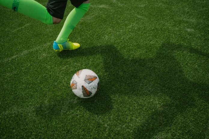 a football ball on the grass