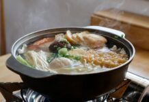 겨울철 식단 아이디어 a pot of soup on top of a stove