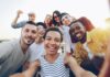 “서로의 건강 챙기는 소셜 크루 액티비티, 즐거움과 웰빙을 한번에” Diverse group of friends taking a selfie outdoors selfie
